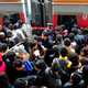 Passengers rush to board trains at Changsha Railway Station, Hunan province January 8, 2012. Chinese New Year, or Spring Festival, is the bigger of two "Golden Week" holidays, giving migrant workers their only chance of the year to return to their home provinces with gifts for their families. More than 200 million people are expected to take to the railways over this year's holiday, the biggest movement of humanity in the world. Picture taken January 8, 2012. REUTERS/China Daily (CHINA - Tags: SOCIETY TRANSPORT) CHINA OUT. NO COMMERCIAL OR EDITORIAL SALES IN CHINA - GM1E8190Y3C01